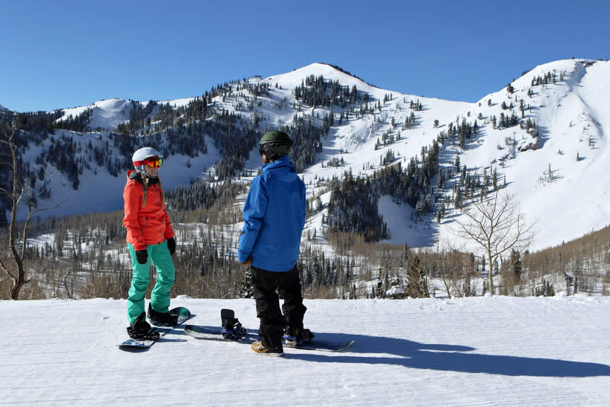 Snowboarders Standing Enjoying View: Esqui Park City